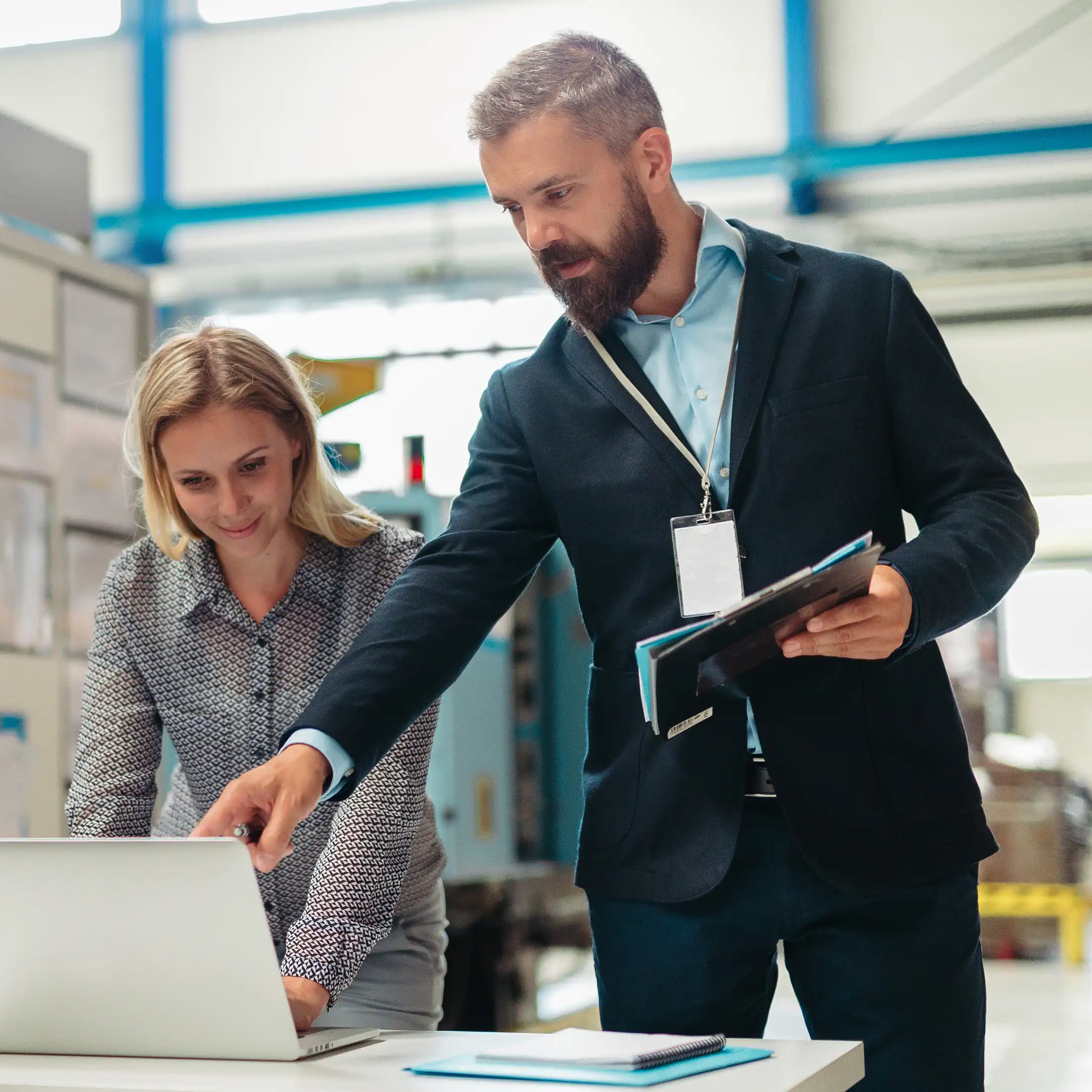 Industrial sales team analyzing data